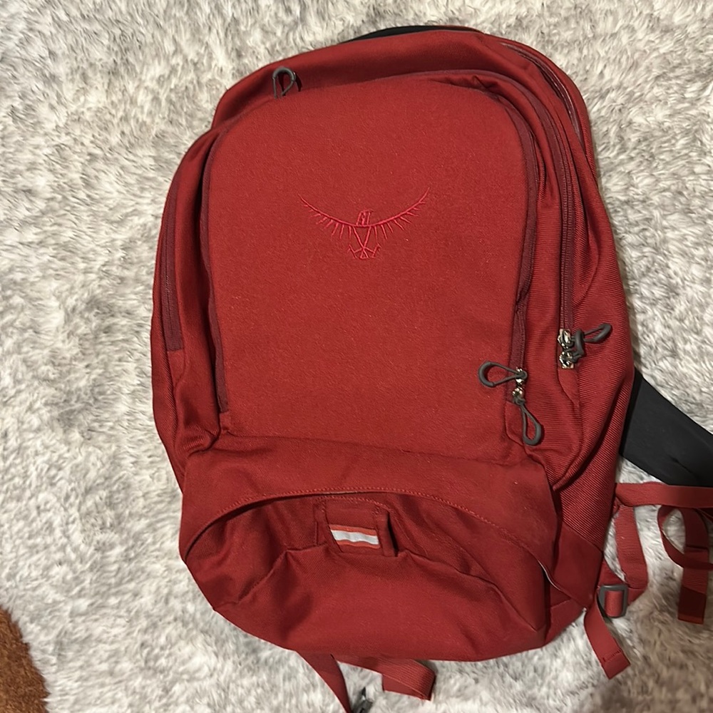 Nearly new Osprey Laptop Tech backpack. In Red.